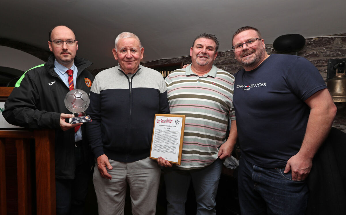 Distinguished Service Award, Adrian O'Donoghue, Cork AUL Tony Murray, with his award, also included are members of Tony's family. Distinguished Service Award, Adrian O'Donoghue, Cork AUL Tony Murray, with his award, also included are members of Tony's family.