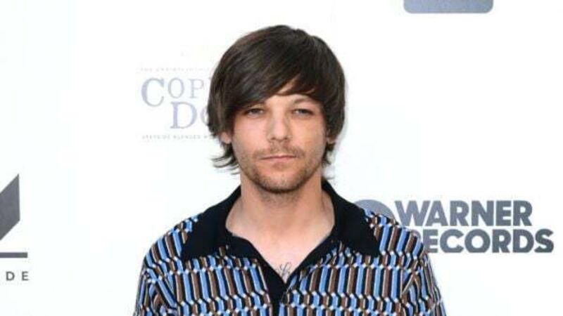 Louis Tomlinson forced to reschedule events after breaking arm in fall Louis Tomlinson forced to reschedule events after breaking arm in fall