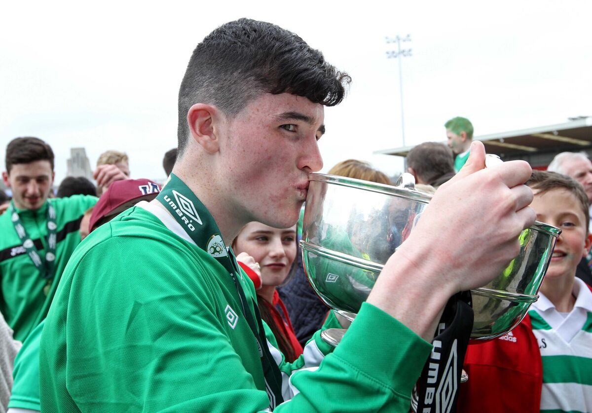 Darren Murphy, Ballincollig, kisses the cup after the 2016 win over Ringmahon Rangers. Picture: Jim Coughlan. Darren Murphy, Ballincollig, kisses the cup after the 2016 win over Ringmahon Rangers. Picture: Jim Coughlan.