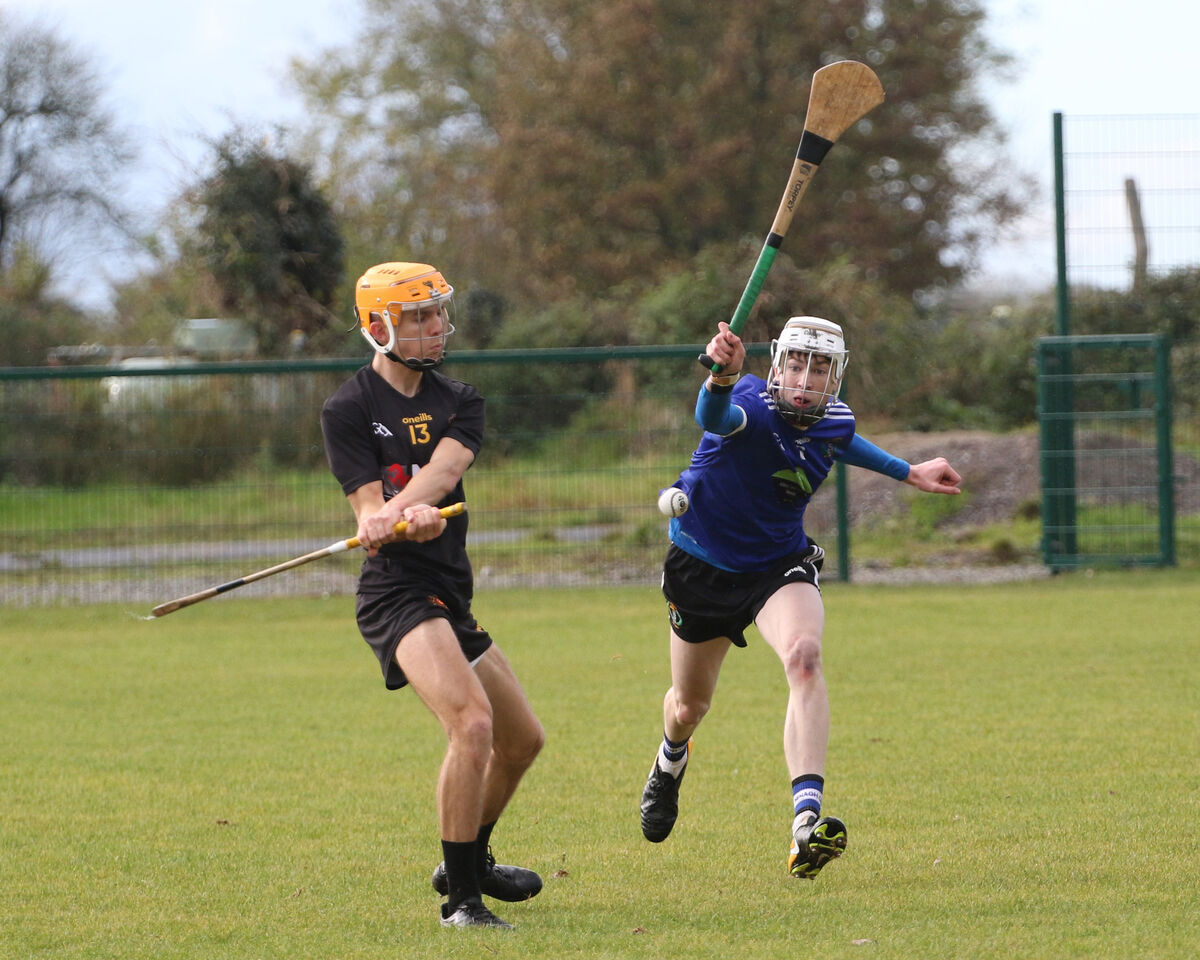 Mark O'Dwyer, CBS Cork, clearing the sliotar against Cian Connolly, Nenagh CBS in the Harty Cup Match in Ballyagran. Picture: Brendan Gleeson