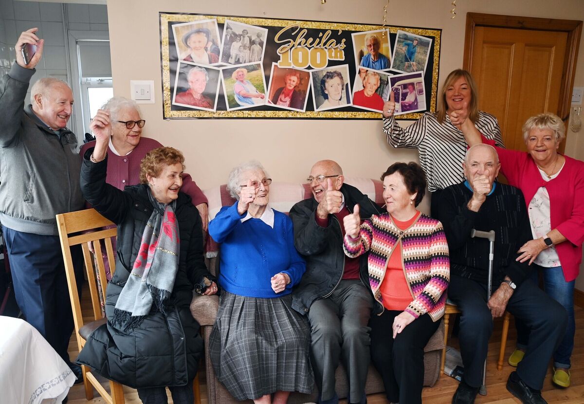Sheila O'Regan celebrating her 100th birthday with neighbours at Whites Cross, Cork. Picture: Denis Minihane. Sheila O'Regan celebrating her 100th birthday with neighbours at Whites Cross, Cork. Picture: Denis Minihane.