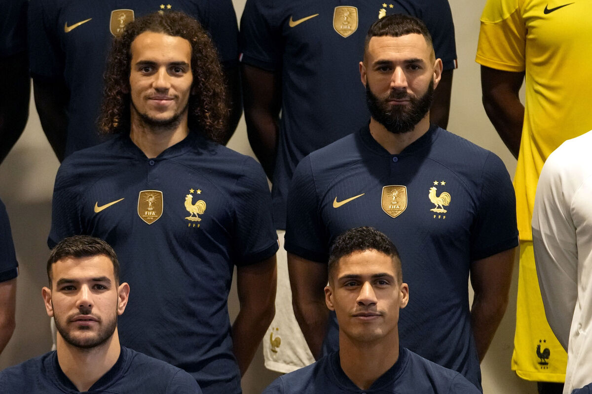 France's soccer team players Karim Benzema, top right, Matteo Guendouzi, top left, Raphael Varane, bottom right, and Theo Fernandez, bottom left, pose for a team photo group prior to the upcoming World Cup in Qatar. Picture: AP Photo/Thibault Camus