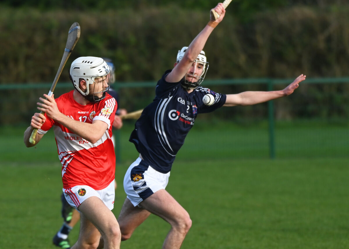 Midleton CBS' Dylan McCarthy shoots from St Joseph's Tulla's Colin Hogan. Picture: Eddie O'Hare