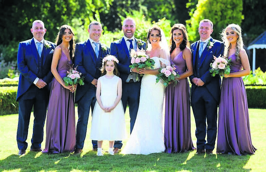 ALL SMILES: Claire Thompson and Stephen Ring with their wedding party, which included Claire’s daughter Saoirse, Stephen’s daughter Hayley, and the couple’s daughter Tessa. ALL SMILES: Claire Thompson and Stephen Ring with their wedding party, which included Claire’s daughter Saoirse, Stephen’s daughter Hayley, and the couple’s daughter Tessa.