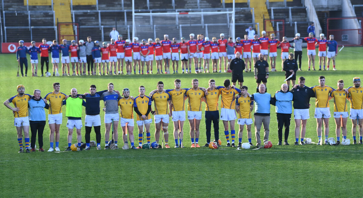 Erins Own (top) and Kilshannig players during a minutes silence for the late Michael Ellard, Irish Examiner and Echo reporter before the Co Op Superstores Cork JAHC final at Pairc Ui Chaoimh. Picture; Eddie O'Hare