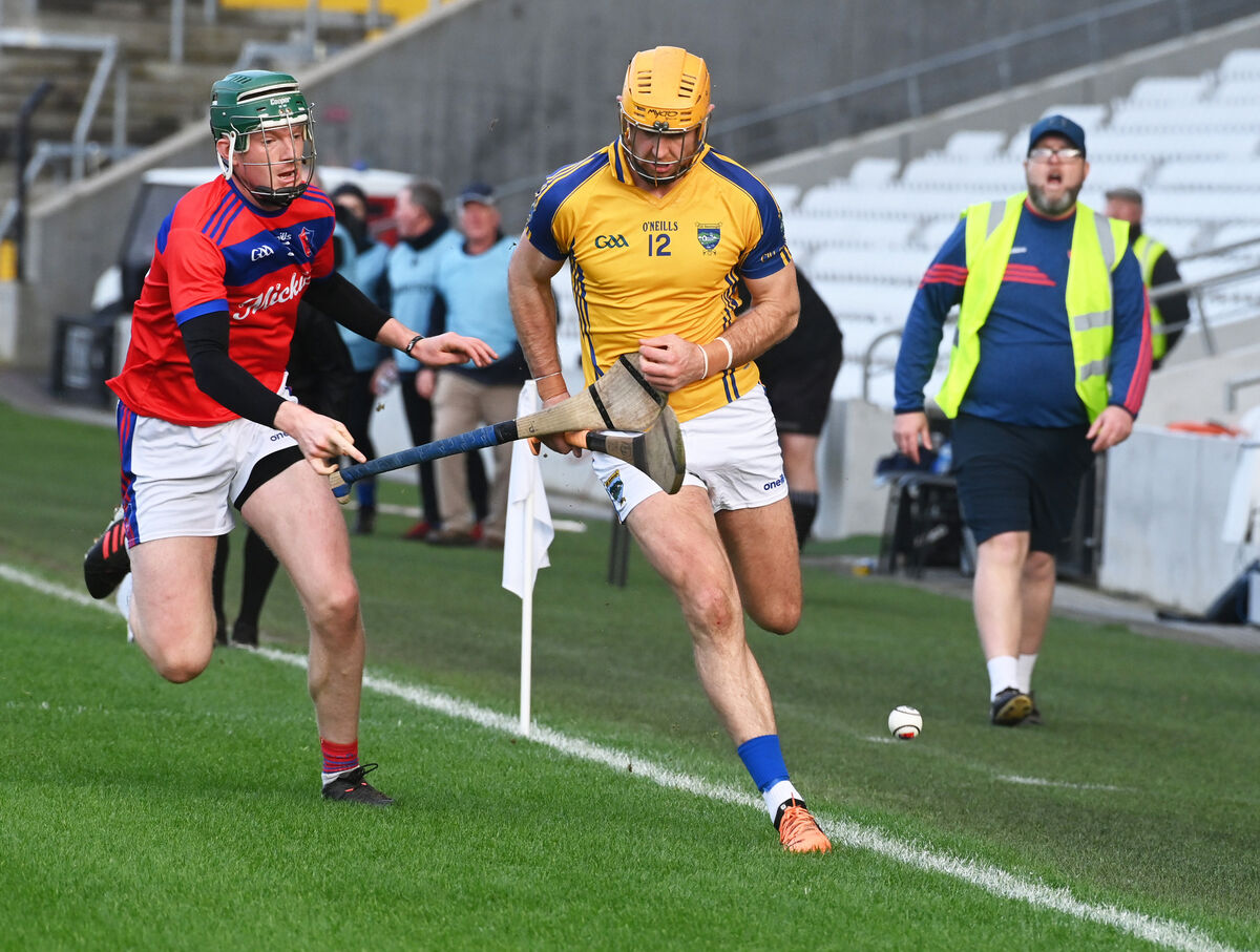 Kilshannig's Killian O'Hanlon is tackled by Erins Own's Sean Power during the Co Op Superstores Cork JAHC final at Pairc Ui Chaoimh. Picture; Eddie O'Hare