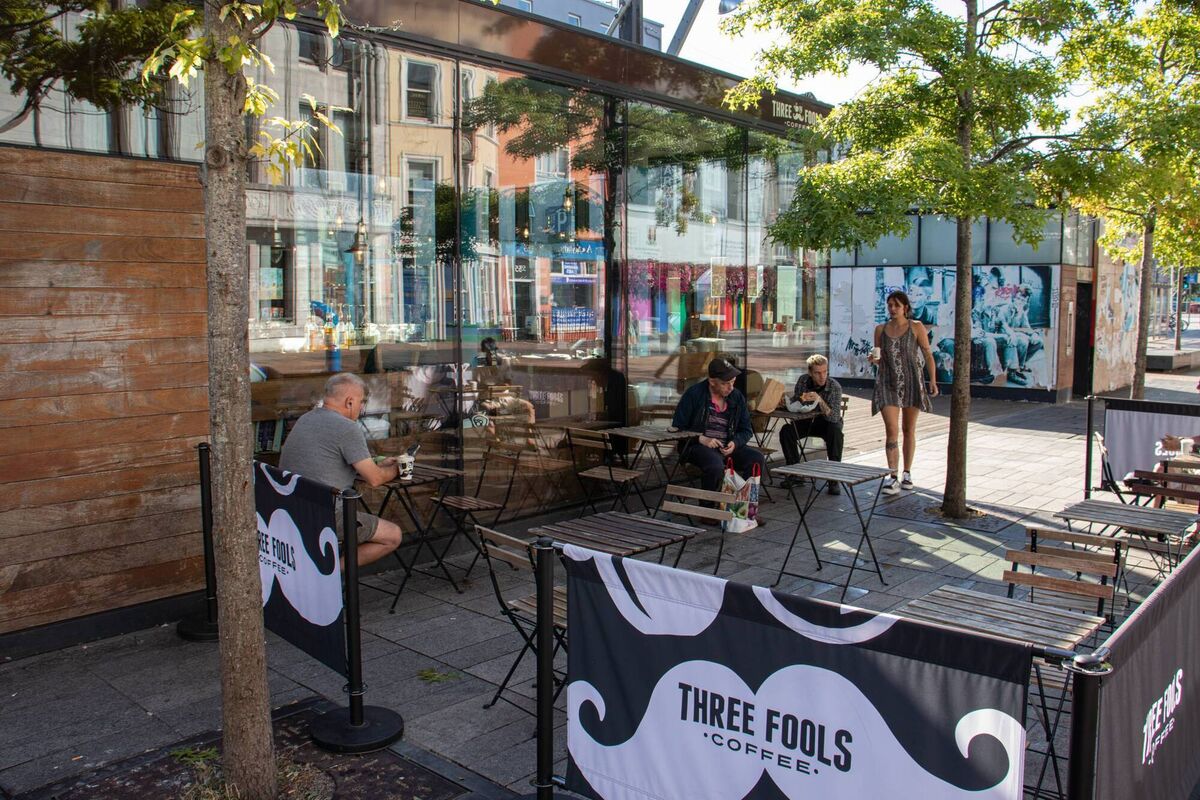 Reflections of Grand Parade at Three Fools Coffee Reflections of Grand Parade at Three Fools Coffee