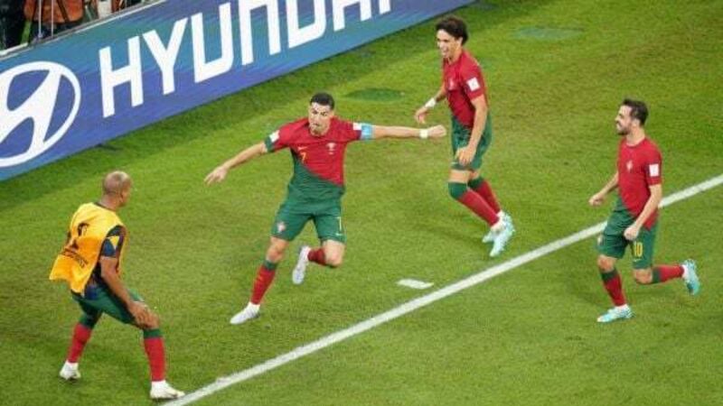 Cristiano Ronaldo makes World Cup history as Portugal hold off Ghana in opener