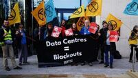 Crowd gathers at Amazon’s European HQ in Dublin as part of Black Friday protest