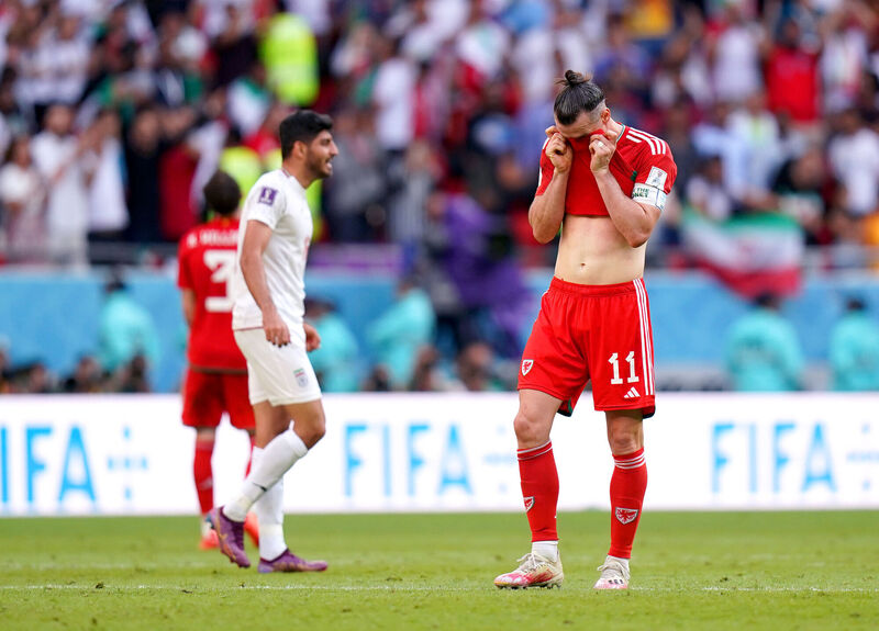 Wales' Gareth Bale appears dejected during the FIFA World Cup Group B match against Iran at the Ahmad Bin Ali Stadium, Al-Rayyan. Picture: Adam Davy/PA Wire.