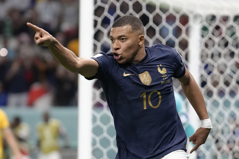 France's Kylian Mbappe celebrates after scoring against Australia during the World Cup group D match against Australia, at the Al Janoub Stadium in Al Wakrah, Qatar, on Tuesday. Picture: AP Photo/Christophe Ena