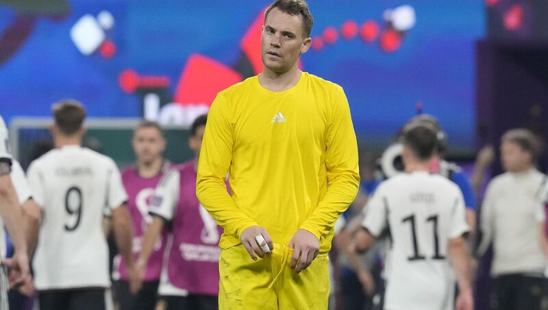 Germany's goalkeeper Manuel Neuer is dejected at the end of the World Cup group E match against Japan, at the Khalifa International Stadium in Doha, Qatar, on Wednesday. Picture: AP Photo/Eugene Hoshiko