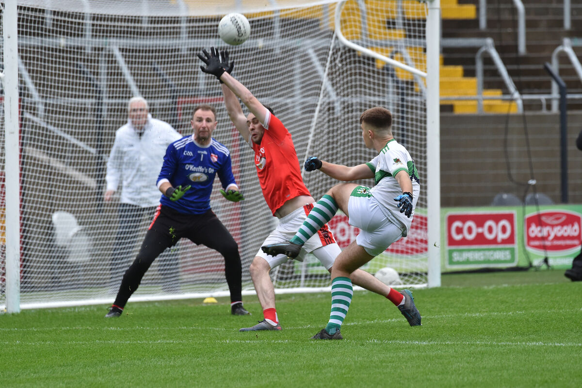 Grantus Bucinskas, Kanturk, kicking a point watched by Rathmore keeper Kenneth O'Keeffe and Dan Murphy at Páirc Uí Chaoimh. Picture: Dan Linehan Grantus Bucinskas, Kanturk, kicking a point watched by Rathmore keeper Kenneth O'Keeffe and Dan Murphy at Páirc Uí Chaoimh. Picture: Dan Linehan