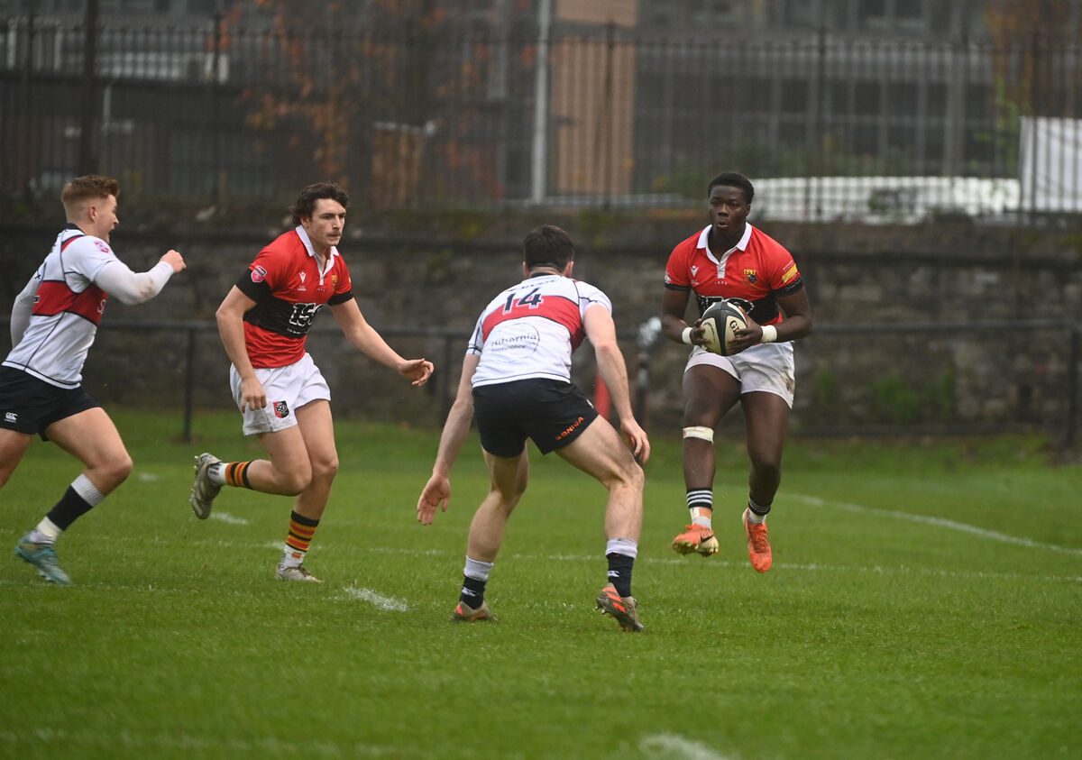  Emeka Asiegbu, UCC, with possession on the wing against Old Wesley. Picture: Larry Cummins
