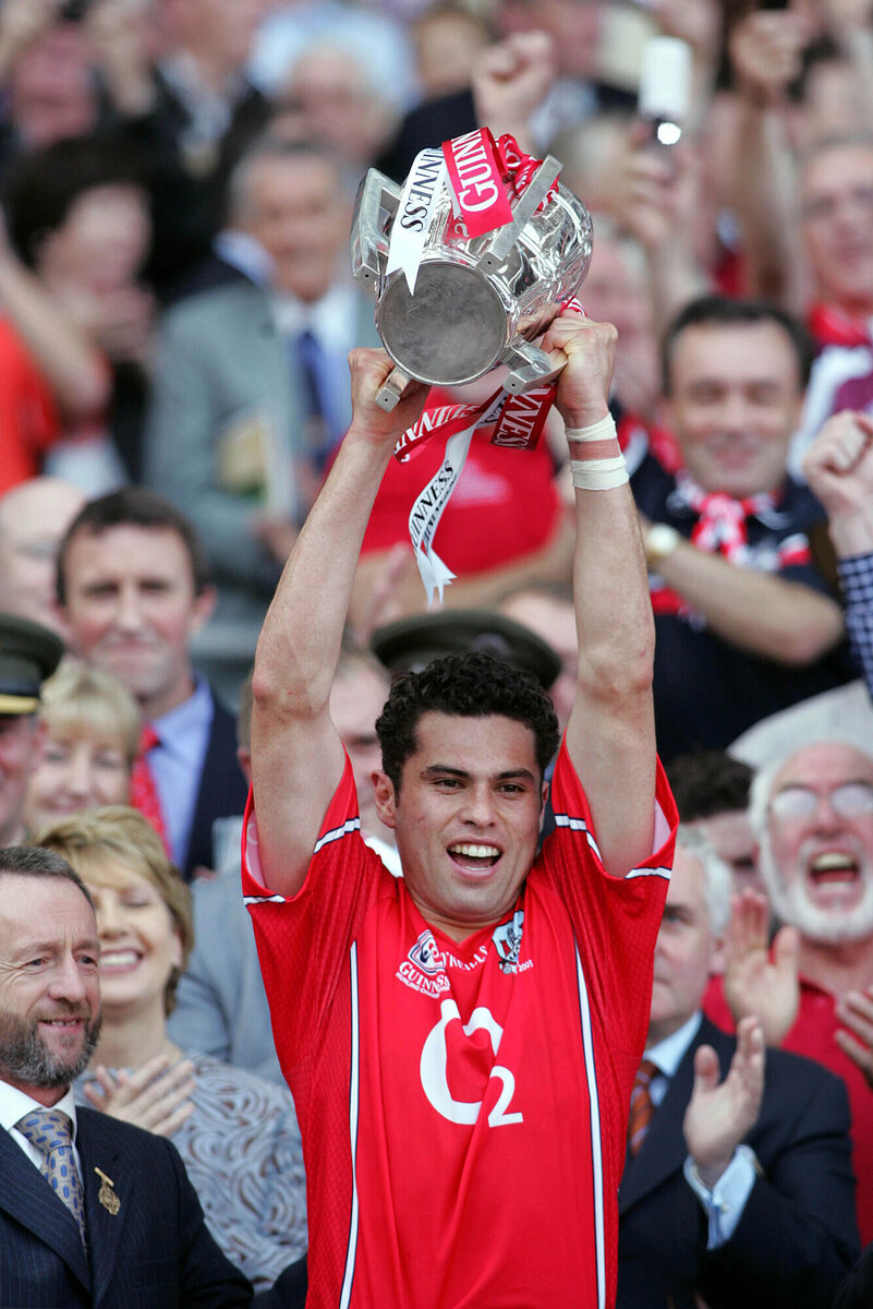 Seán Óg Ó hAilpín lifts the Liam MacCarthy Cup after the win over Galway in the 2005 All-Ireland SHC final. Cork wore this jersey style from 2004-06. Picture: Inpho/Tom Honan