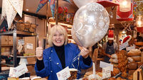 Popular English Market stall sells bread at 90s prices to celebrate business milestone