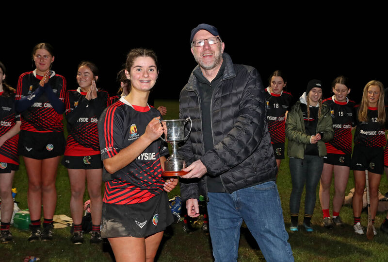  Kelly Honohan, Coachford College, receives the Cup from Diarmuid Hickey, Deputy Principal Coachford College. Picture: Jim Coughlan.