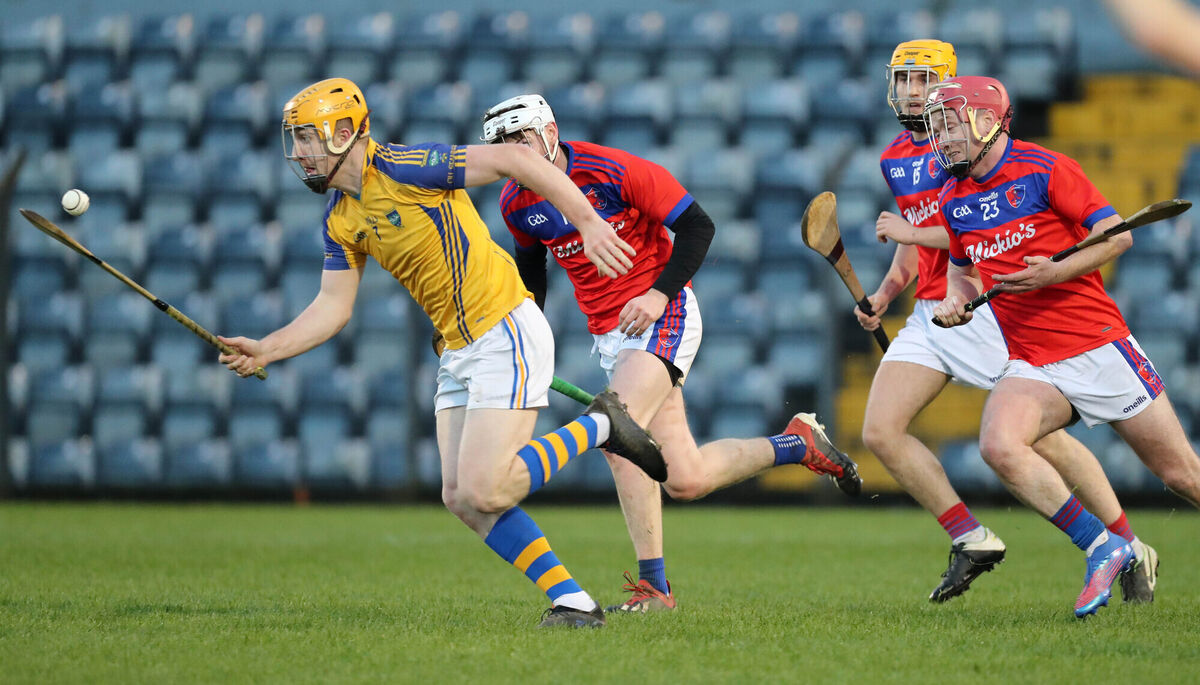  Kieran Twomey, Kilshannig, taking on Ger O'Mahony, Andrew O'Sullivan and Andrew Power, Erin's Own. Picture: Jim Coughlan.