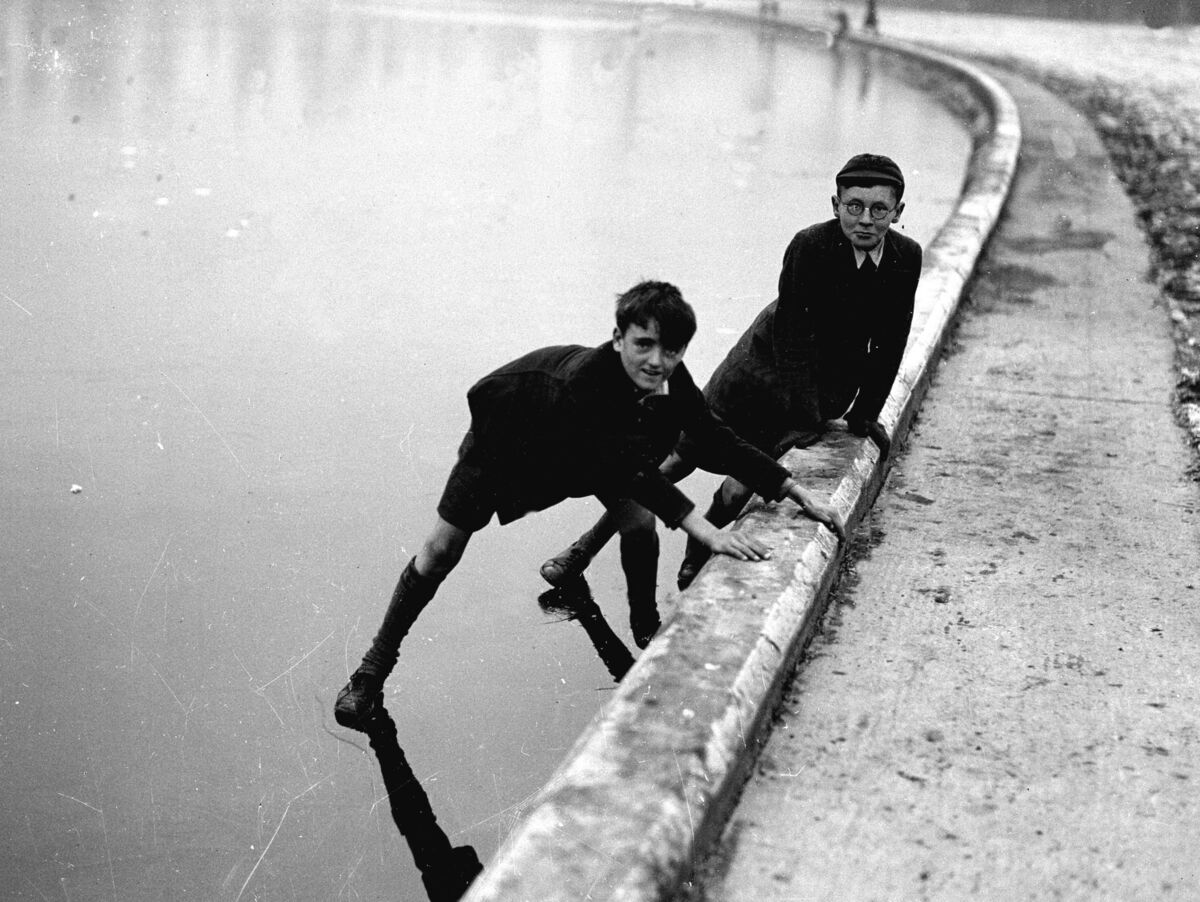 Boys skating on The Lough in 1937. 