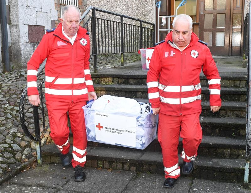 Pat O'Connor, Irish Red Cross Society, Cork treasurer and Ted Noonan, Regional Director of Units, Southern Region, Irish Red Cross Society, Cork, with welcome packs for delivery to Ukraine refugee centres in Cork. Picture: David Keane. Pat O'Connor, Irish Red Cross Society, Cork treasurer and Ted Noonan, Regional Director of Units, Southern Region, Irish Red Cross Society, Cork, with welcome packs for delivery to Ukraine refugee centres in Cork. Picture: David Keane.