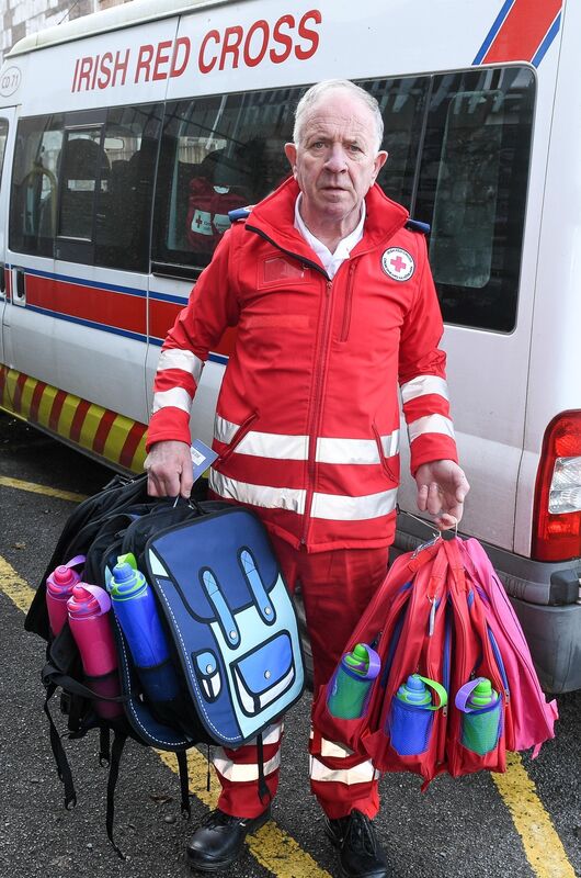 Pat O'Connor, Irish Red Cross Society, Cork treasurer, with school bags for delivery to Ukraine refugee centres in Cork.Picture: David Keane. Pat O'Connor, Irish Red Cross Society, Cork treasurer, with school bags for delivery to Ukraine refugee centres in Cork.Picture: David Keane.