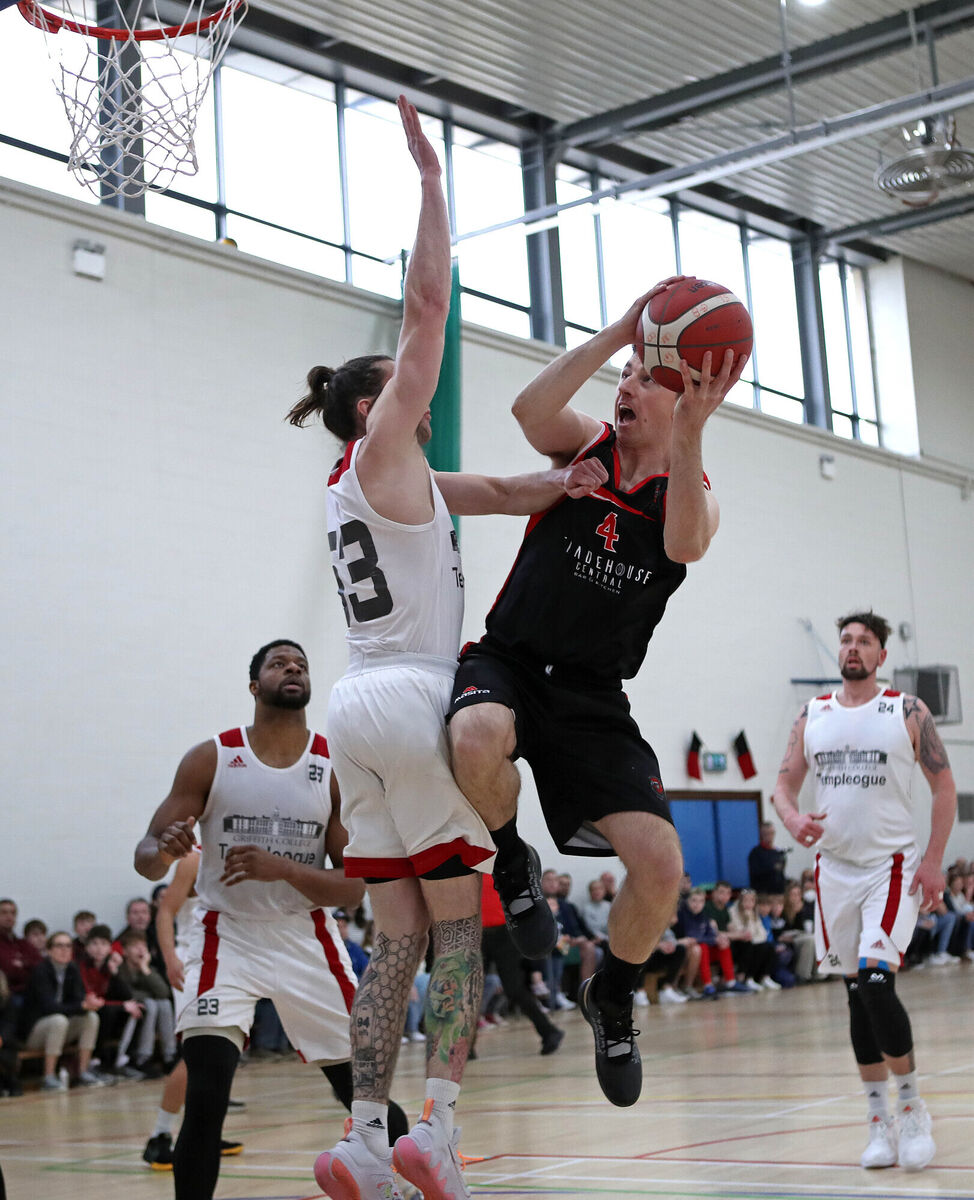  Adrian O'Sullivan, Ballincollig, rises above Lorcan Murphy, Templeogue. Picture: Jim Coughlan.