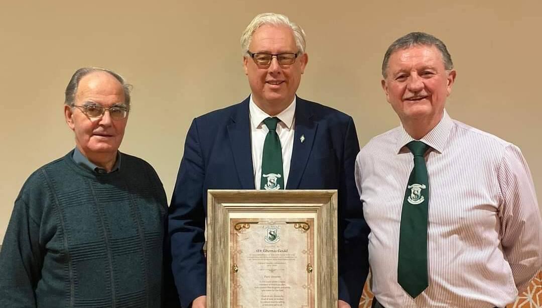 Outgoing St Vincent's chairperson Thomas Gould with William Leahy, and William McCarthy, right, the new chair. 