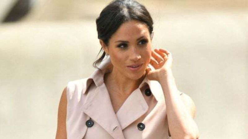 Meghan avoided colourful clothes in fear of clashing with Queen, Camilla and Kate Meghan avoided colourful clothes in fear of clashing with Queen, Camilla and Kate