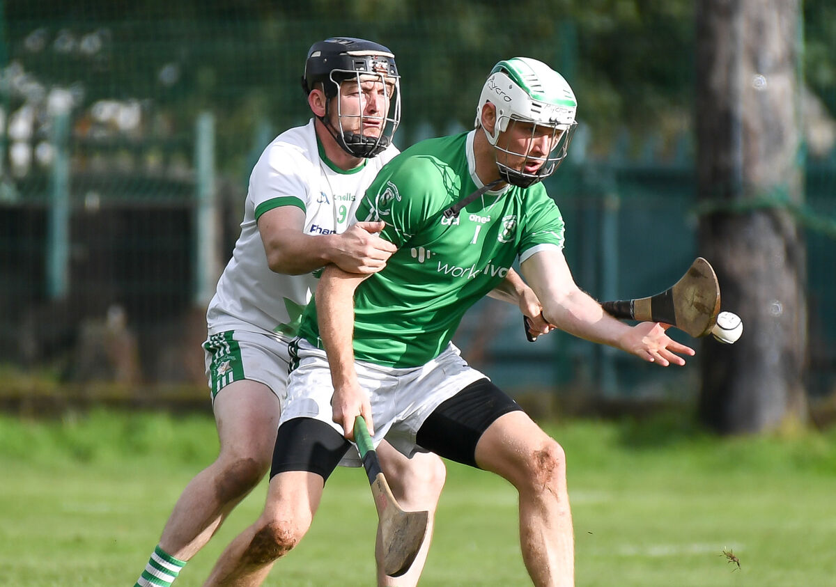  St Vincent's Ryan Fielding wins possession under pressure from Passage's Graham Carroll. Picture: David Keane.