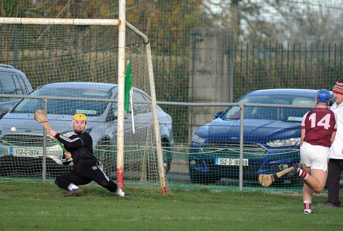 Our Lady's, Templemore's Josh McMahon scores a goal despite the great efforts of Rochestown goalkeeper Luke Kiely. Picture: Denis Minihane.