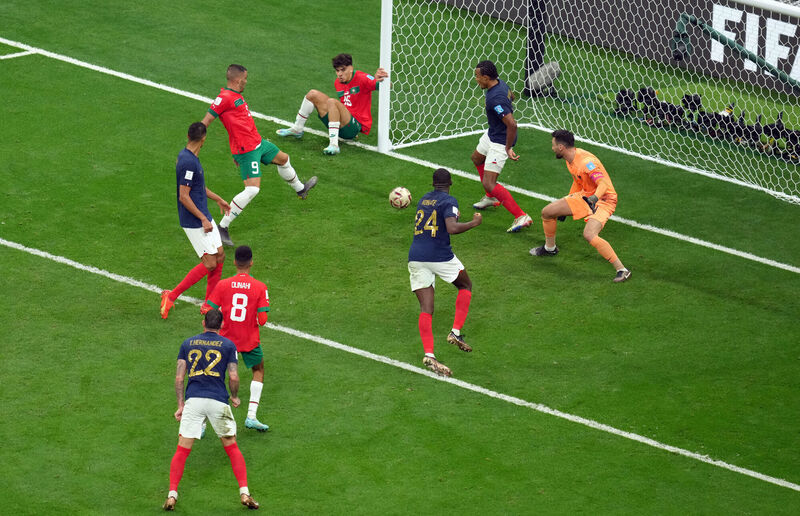 France's Jules Kounde blocks a shot on the line from Morocco's Abderrazak Hamdallah during the FIFA World Cup Semi-Final match at the Al Bayt Stadium in Al Khor, Qatar. Picture: Nick Potts/PA Wire