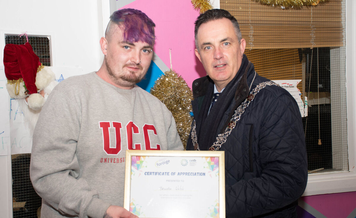 Deputy Lord Mayor Damien Boylan pictured presenting Brendan Walsh a Certificate of Appreciation Award for his work in the International Youth Club at the recent Ukraininan Children Christmas Party in the Linkpoint Youth Centre in Knocknaheeny. Picture: Howard Crowdy Deputy Lord Mayor Damien Boylan pictured presenting Brendan Walsh a Certificate of Appreciation Award for his work in the International Youth Club at the recent Ukraininan Children Christmas Party in the Linkpoint Youth Centre in Knocknaheeny. Picture: Howard Crowdy