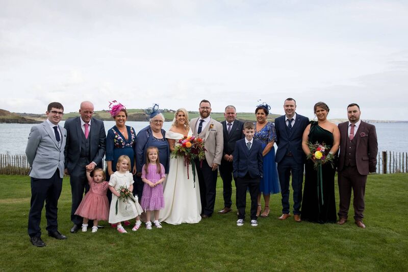The bride and groom with family members. The wedding party included the bride’s sister Michelle and Jonathan’s childhood friend Shane O’Riordan, as well as flower girls Eabha Forde and Penny Woodward. The bride and groom with family members. The wedding party included the bride’s sister Michelle and Jonathan’s childhood friend Shane O’Riordan, as well as flower girls Eabha Forde and Penny Woodward.