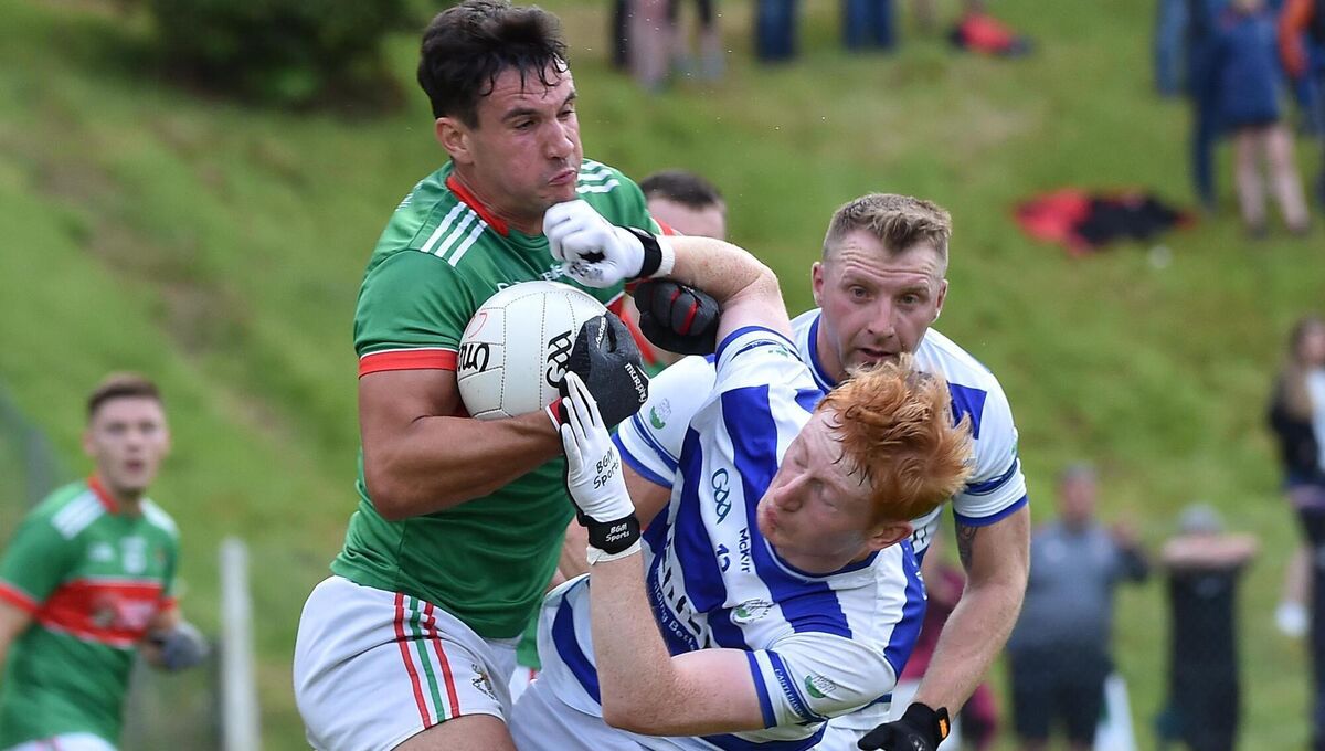 Tom Clancy, Clonakilty, getting the better of Jack Cahalane, Castlehaven. Picture: Dan Linehan