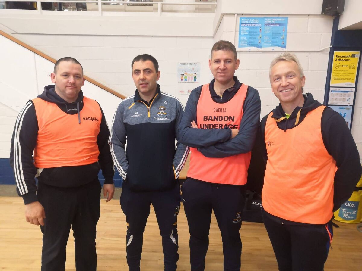 Anthony Nyhan, John Ahern, Gareth Daly and Richard Tarrant who assisted in coaching the kids during the recent inclusive Bandon GAA camp. 