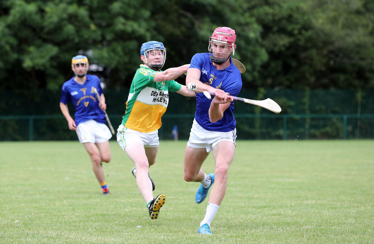  Ben O'Connor, St Finbarr's, clears from Nicky Kelleher, Bride Rovers. Picture: Jim Coughlan.