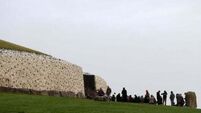 Newgrange illuminated as public gather to celebrate winter solstice