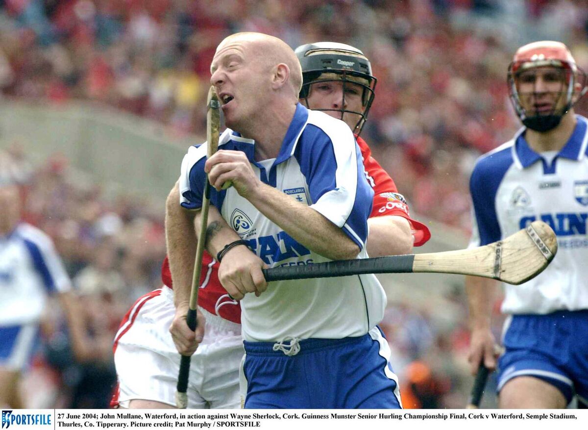 John Mullane, Waterford, in action against Wayne Sherlock, Cork, in 2004. Picture: Pat Murphy/SPORTSFILE