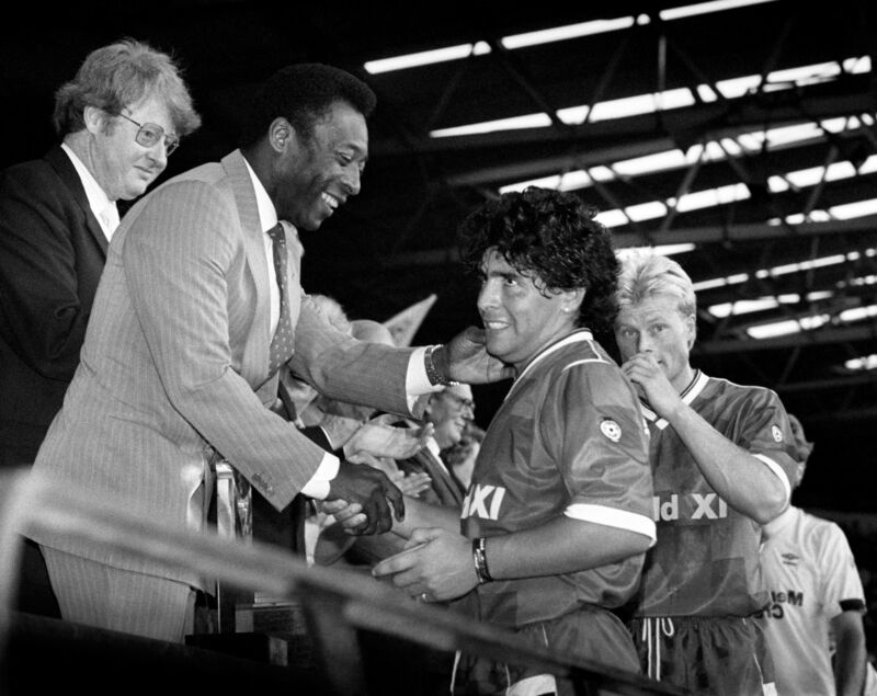Diego Maradona is greeted by guest of honour Pele after the Centenary Classic at Wembley in 1987. Diego Maradona is greeted by guest of honour Pele after the Centenary Classic at Wembley in 1987.