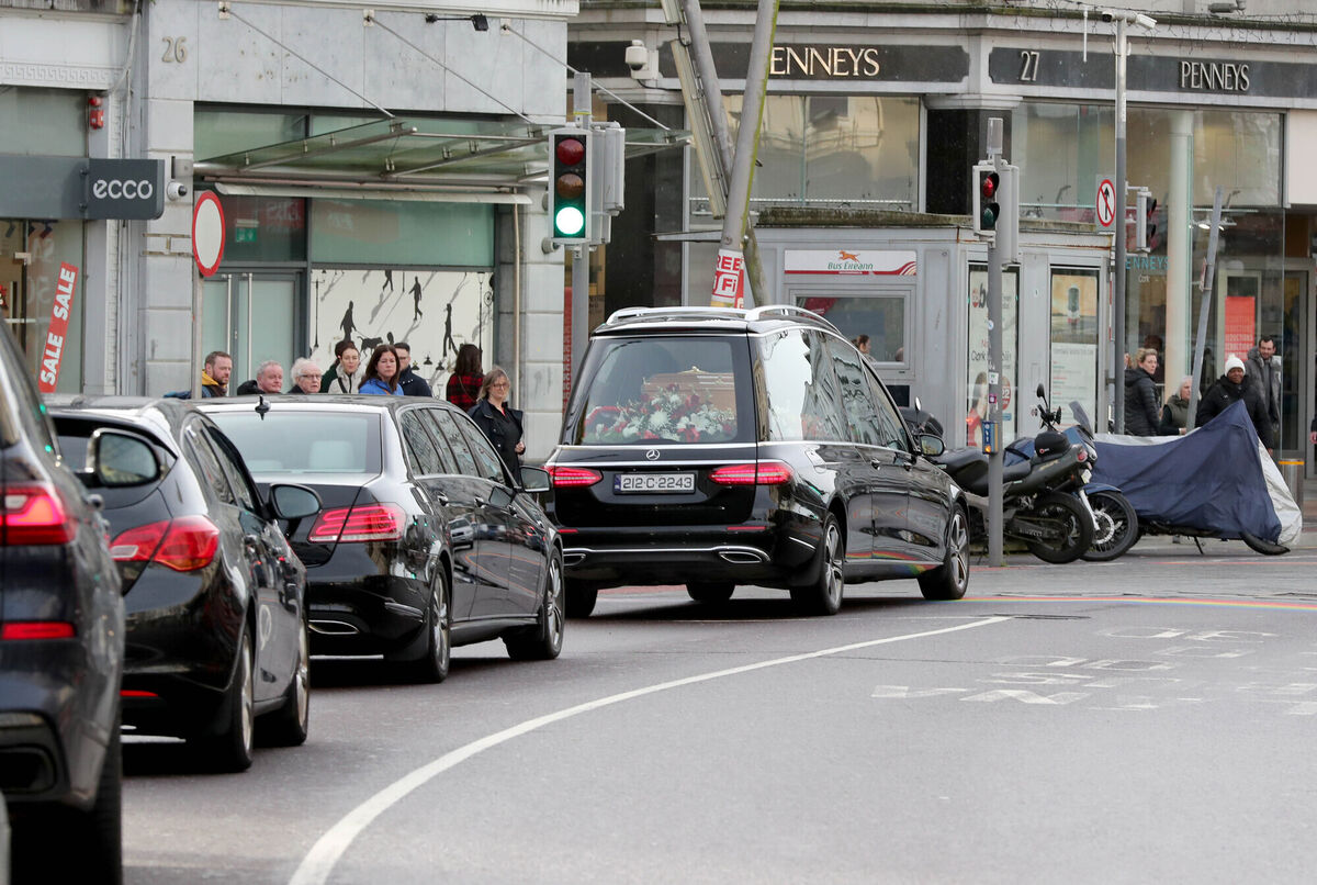 Funeral cortege of former Echo Boy, Michael O'Regan, on Patrick Street, Cork. Funeral cortege of former Echo Boy, Michael O'Regan, on Patrick Street, Cork.