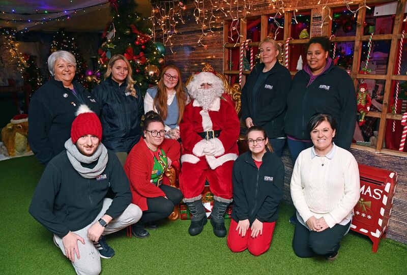 Karen O'Mahony, (front right) CEO and co-founder, Rainbow Club Cork, with Santa and Team Rainbow at the Santa Experience at Mahon Community Centre, Cork. Picture Denis Minihane.