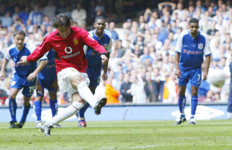 Manchester United's Ruud van Nistelrooy scores his side's second goal, from the penalty spot, against Millwall during the FA Cup Final at the Millennium Stadium, Cardiff, May 22 2004. Picture: Martin Rickett 