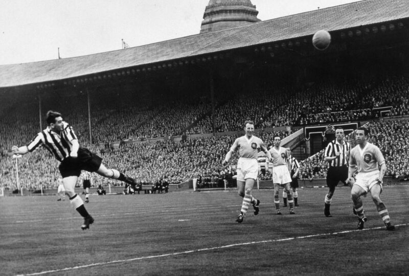 Newcastle United's Jackie Milburn, left, scores his first minute goal against Manchester City in the May 7, 1955, FA Cup Final at Wembley. Picture: Popperfoto/Getty Images