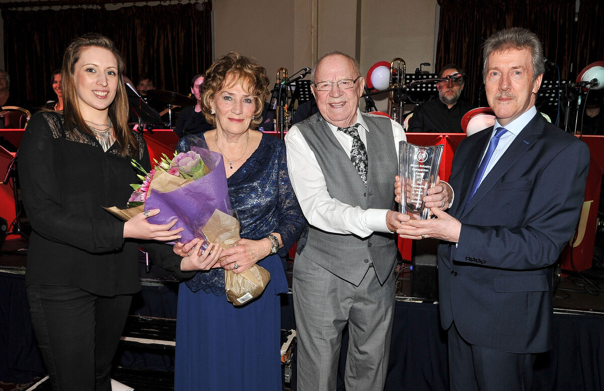 Musician and composer Jack Brierley, second right, is presented with the Music Industry Companion Award by Stephen Travers of the Miami Showband and his wife Frances receives a bouquet of flowers from Tuxedo Junction band member Kirsty Tobin, at a special function in the Clayton Hotel, Silver Springs. Picture: David Keane.