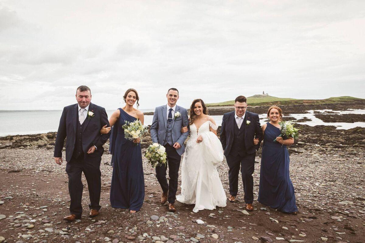 The couple with their wedding party