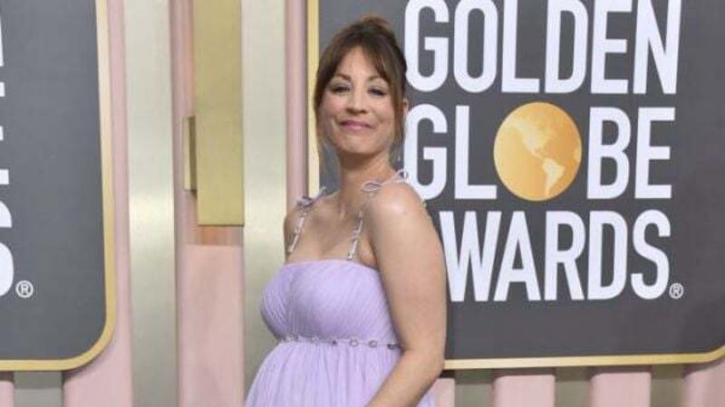 Kaley Cuoco debuts growing baby bump on Golden Globes red carpet