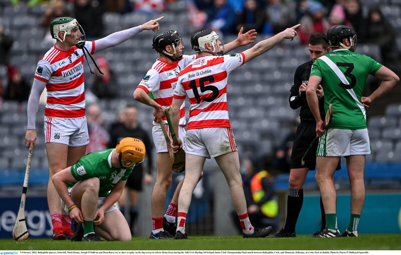 Ballygiblin players, from left, Mark Keane, Joseph O'Sullivan and Dean Barry try to show a replay on the big screen to referee Brian Keon during the AIB All-Ireland Club JHC final against Mooncoin last year. Pictutre: Piaras Ó Mídheach/Sportsfile