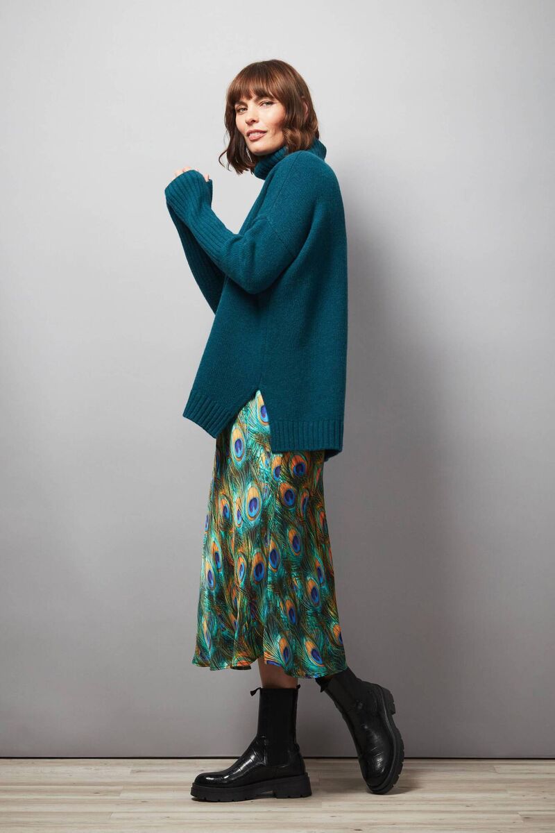 Hope Fashion The Cocoon Roll Neck Jumper Teal; The Peacock Bias Cut Skirt- Peacock Multi, available from Hope Fashion. Hope Fashion The Cocoon Roll Neck Jumper Teal; The Peacock Bias Cut Skirt- Peacock Multi, available from Hope Fashion.