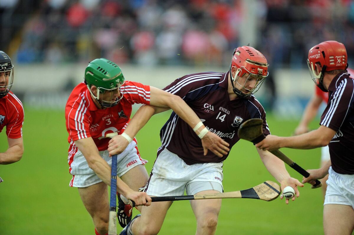 Galways Joe Canning is tackled by Cork's Eoin Cadogan. Picture: Eddie O'Hare