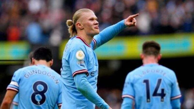 Erling Haaland treble helps Manchester City keep pressure on Arsenal
